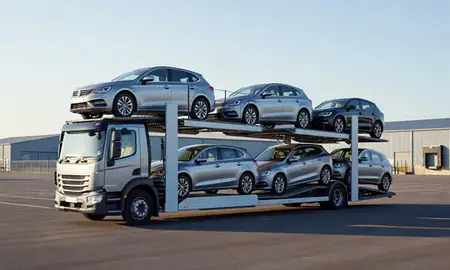 Car transporter loaded with vehicles in Chippenham, Wiltshire, United Kingdom