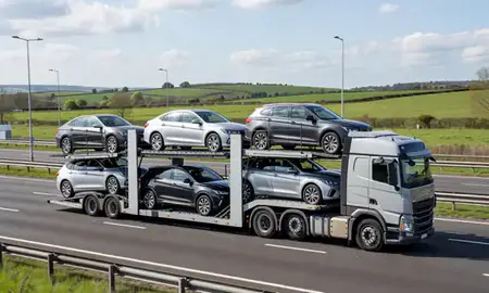 Multi-level car carrier on the motorway to Salisbury, Wiltshire, United Kingdom