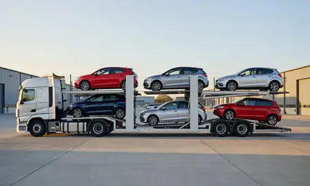 Car transporter parked in an industrial area of Swindon, Wiltshire, United Kingdom