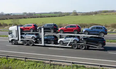 Multi-level car carrier on the motorway to Worcester, Worcestershire, United Kingdom