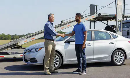 Vehicle owner beside their delivered car in Alabaster, Alabama, United States