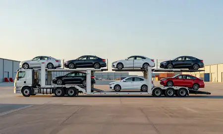 Car transporter parked in an industrial area of Dothan, Alabama, United States