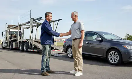 Vehicle owner beside their delivered car in Montgomery, Alabama, United States
