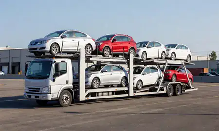 Car transporter loaded with vehicles in Mountain Brook, Alabama, United States