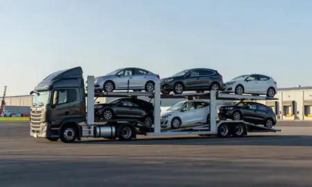 Car transporter loaded with vehicles in Opelika, Alabama, United States