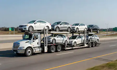 Multi-level car carrier on the highway to Oxford, Alabama, United States