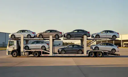 Car transporter parked in an industrial area of Oxford, Alabama, United States
