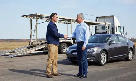 Vehicle owner beside their delivered car in Prattville, Alabama, United States
