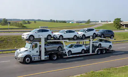 Multi-level car carrier on the highway to Trussville, Alabama, United States