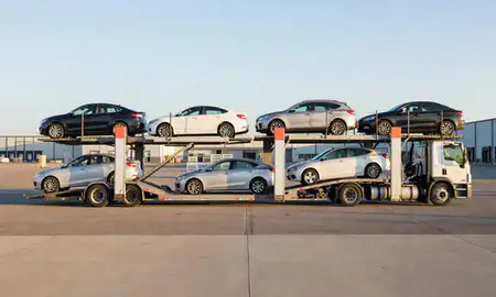 Car transporter parked in an industrial area of Vestavia Hills, Alabama, United States