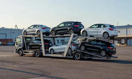 Car transporter loaded with vehicles in Fishhook, Alaska, United States
