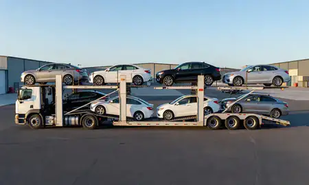 Car transporter parked in an industrial area of Nikiski, Alaska, United States
