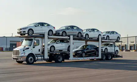 Car transporter loaded with vehicles in Nikiski, Alaska, United States