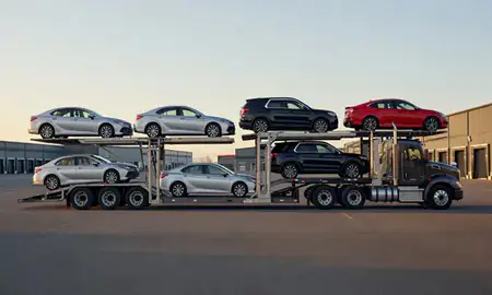 Car transporter parked in an industrial area of Wasilla, Alaska, United States