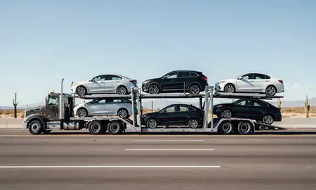 Multi-level car carrier on the highway to Casa Grande, Arizona, United States