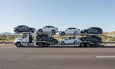 Multi-level car carrier on the highway to Flagstaff, Arizona, United States