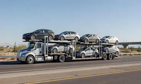 Multi-level car carrier on the highway to Gilbert, Arizona, United States