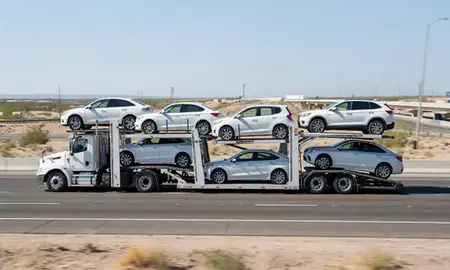 Multi-level car carrier on the highway to Glendale, Arizona, United States