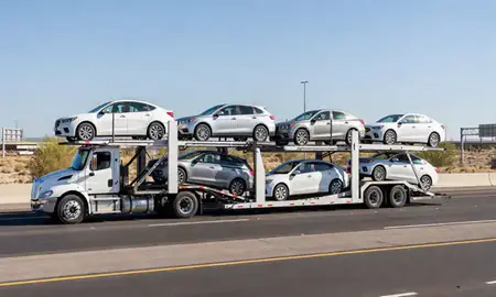 Multi-level car carrier on the highway to Marana, Arizona, United States