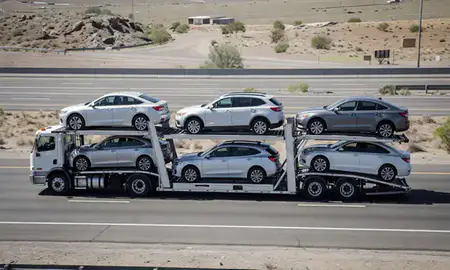 Multi-level car carrier on the highway to Oro Valley, Arizona, United States