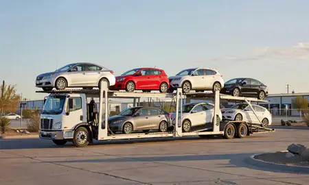 Car transporter loaded with vehicles in Phoenix, Arizona, United States