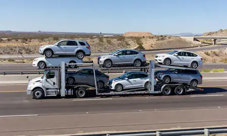 Multi-level car carrier on the highway to Prescott Valley, Arizona, United States