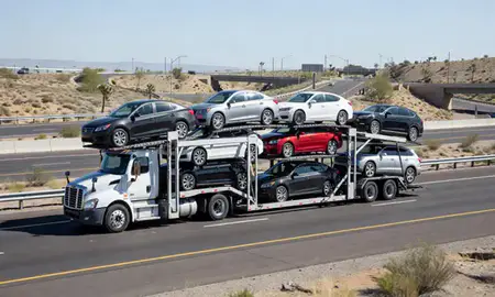 Multi-level car carrier on the highway to Prescott, Arizona, United States