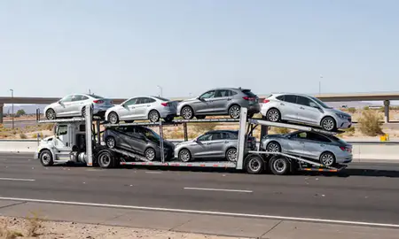 Multi-level car carrier on the highway to Tempe, Arizona, United States