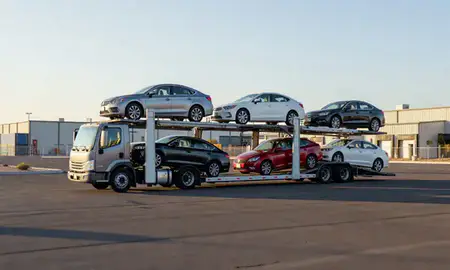 Car transporter loaded with vehicles in Tempe, Arizona, United States