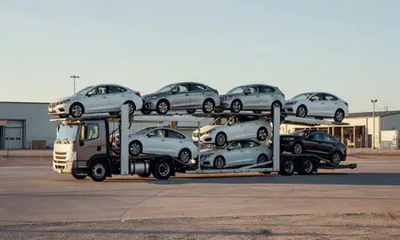Car transporter loaded with vehicles in Tucson, Arizona, United States