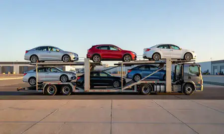 Car transporter parked in an industrial area of Yuma, Arizona, United States