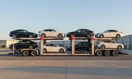 Car transporter parked in an industrial area of Arkansas, United States