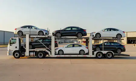 Car transporter parked in an industrial area of Benton, Arkansas, United States