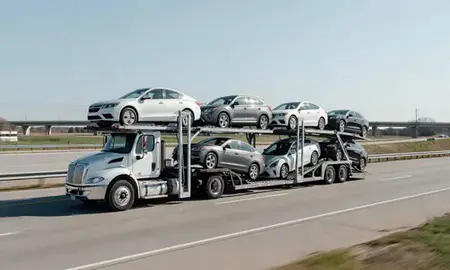 Multi-level car carrier on the highway to Cabot, Arkansas, United States