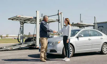 Vehicle owner beside their delivered car in Little Rock, Arkansas, United States