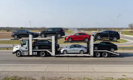 Multi-level car carrier on the highway to North Little Rock, Arkansas, United States