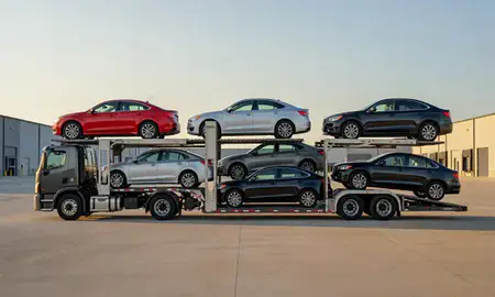 Car transporter parked in an industrial area of North Little Rock, Arkansas, United States