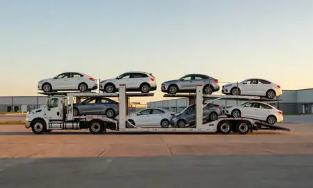 Car transporter parked in an industrial area of Paragould, Arkansas, United States