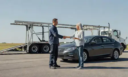 Vehicle owner beside their delivered car in Searcy, Arkansas, United States