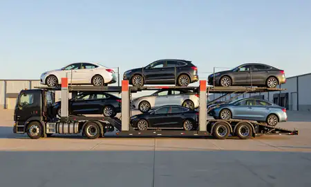Car transporter parked in an industrial area of Sherwood, Arkansas, United States