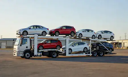 Car transporter loaded with vehicles in Sherwood, Arkansas, United States