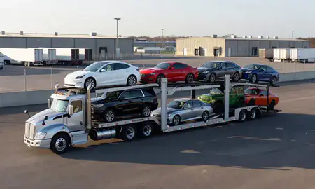 Car transporter loaded with vehicles in Springdale, Arkansas, United States
