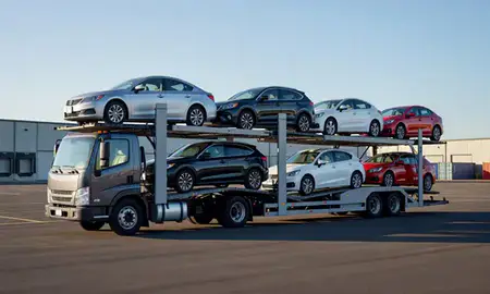 Car transporter loaded with vehicles in Fresno, California, United States