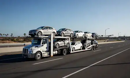 Multi-level car carrier on the highway to Long Beach, California, United States