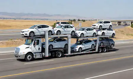 Multi-level car carrier on the highway to Modesto, California, United States