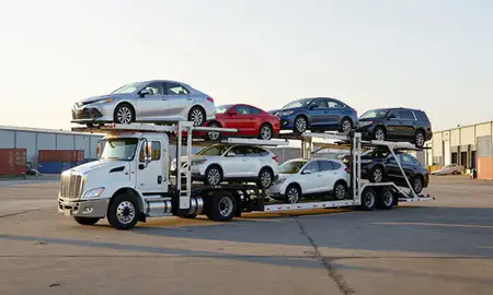 Car transporter loaded with vehicles in Oakland, California, United States