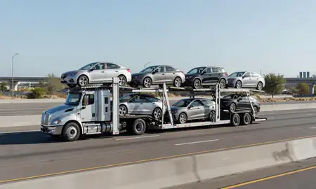 Multi-level car carrier on the highway to Riverside, California, United States