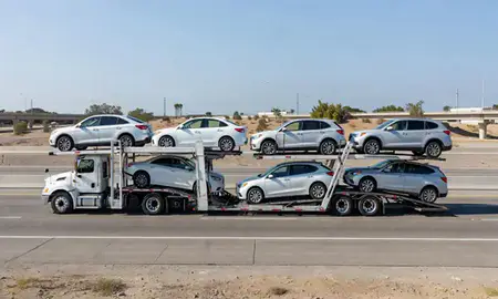 Multi-level car carrier on the highway to San Diego, California, United States