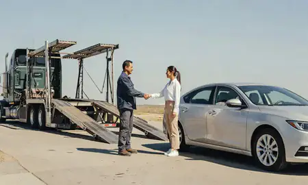 Vehicle owner beside their delivered car in San Diego, California, United States