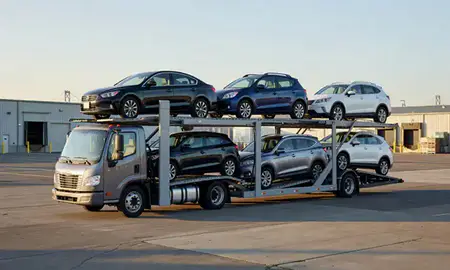 Car transporter loaded with vehicles in San Francisco, California, United States